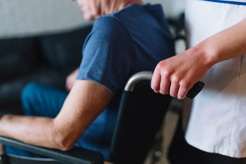 man-wheelchair-old-age-home