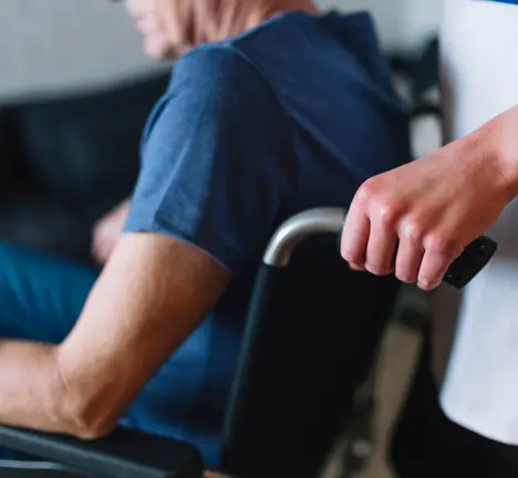 man-wheelchair-old-age-home